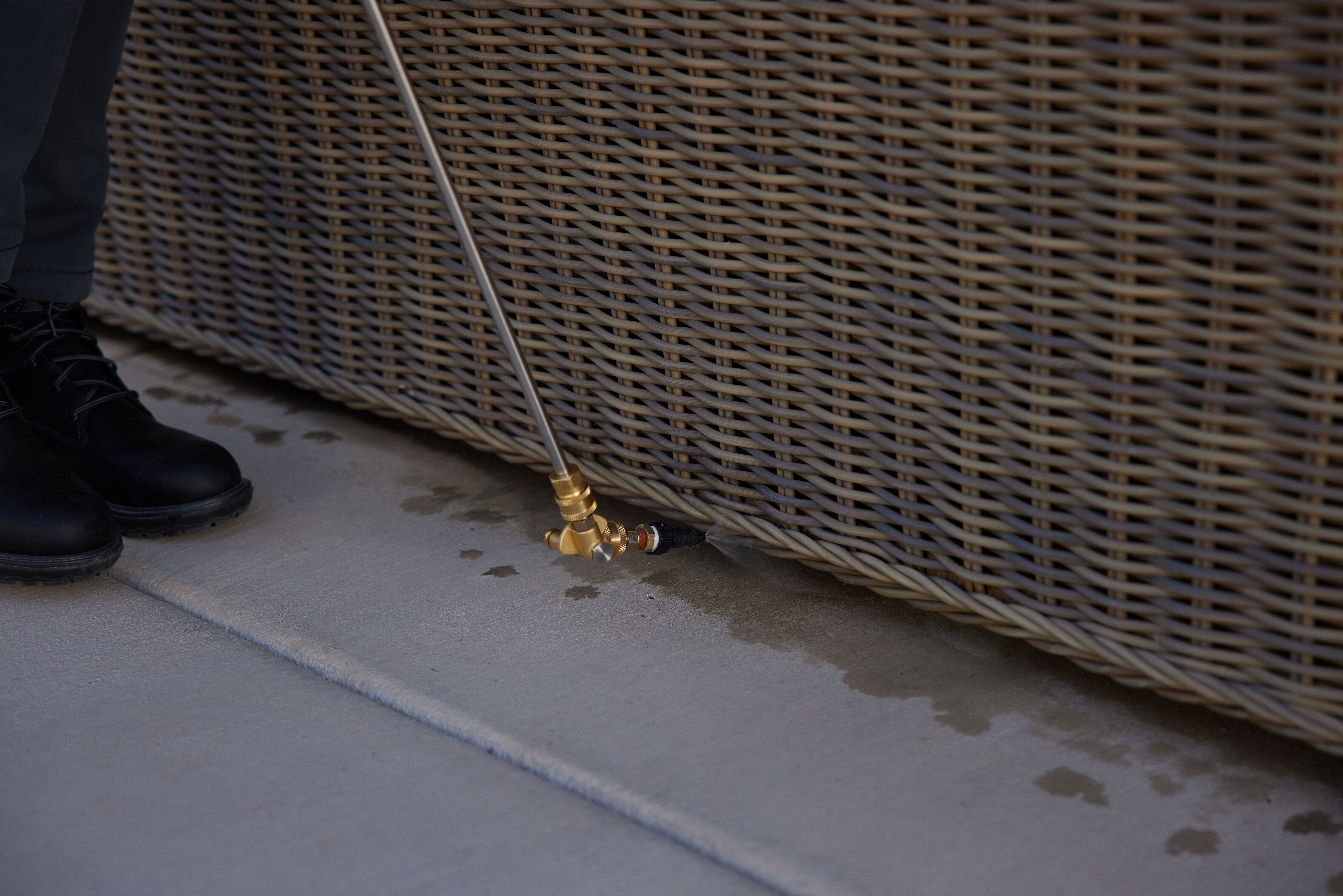 Pest Control Service Removing Spiders from Window Service pro removing spiders from customer's exterior window
